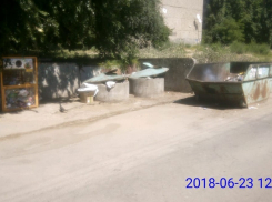 Коммунальщики разгребли гору мусора около воронежского детского сада