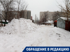 В Воронеже с платной парковки вывезли снег прямо во двор дома
