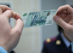 Водителя задержали с взяткой в здании ГИБДД на Обручева