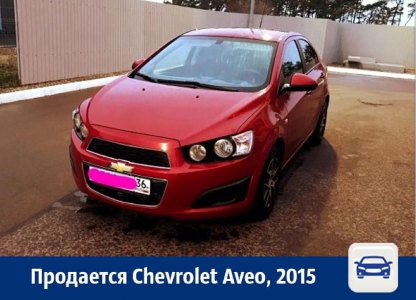 Двухлетняя красная Chevrolet Aveo продается в Воронеже 
